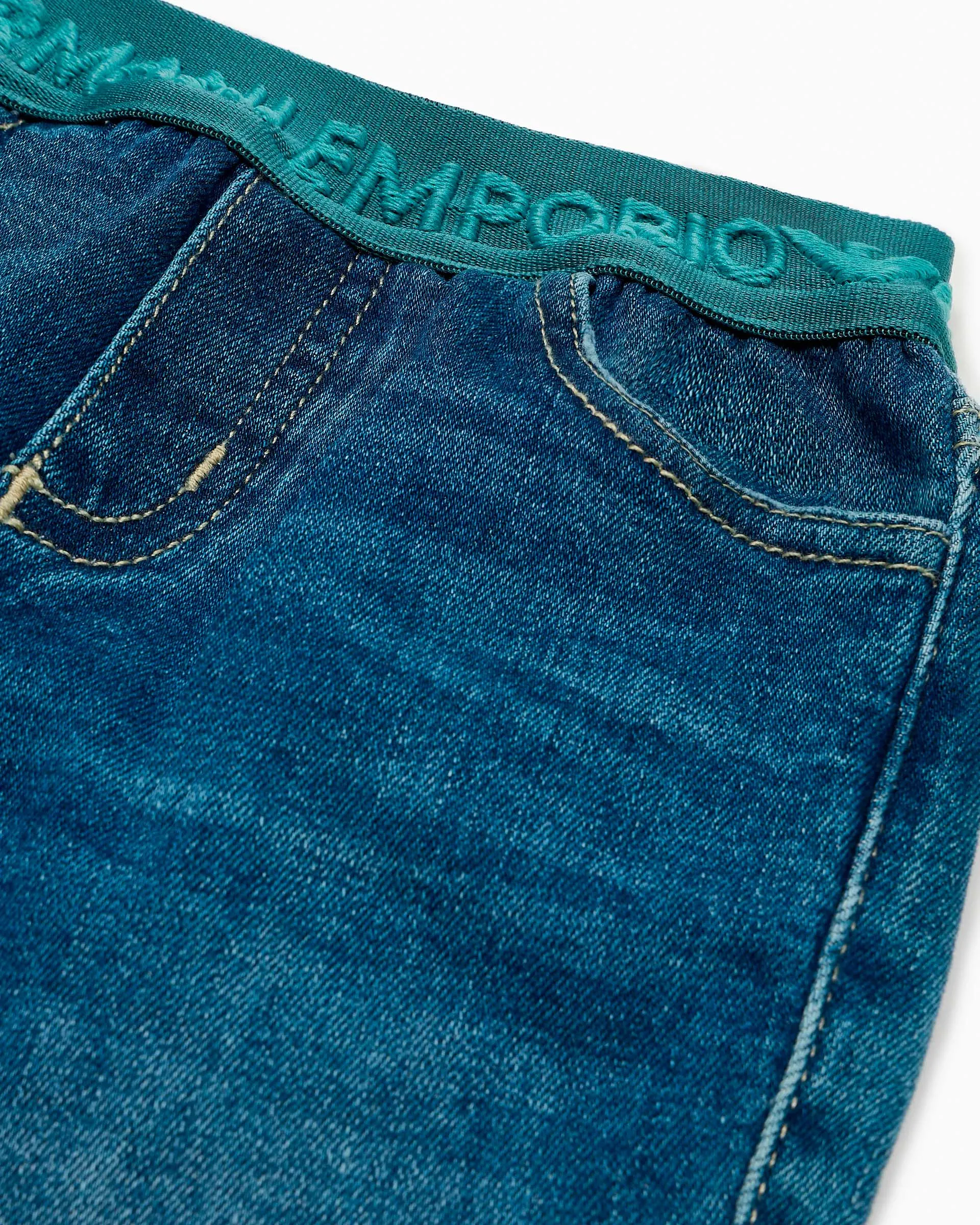 Jeans a lavaggio medio stone washed in cotone stretch con fascia elastica logata ottanio 12-36 mesi