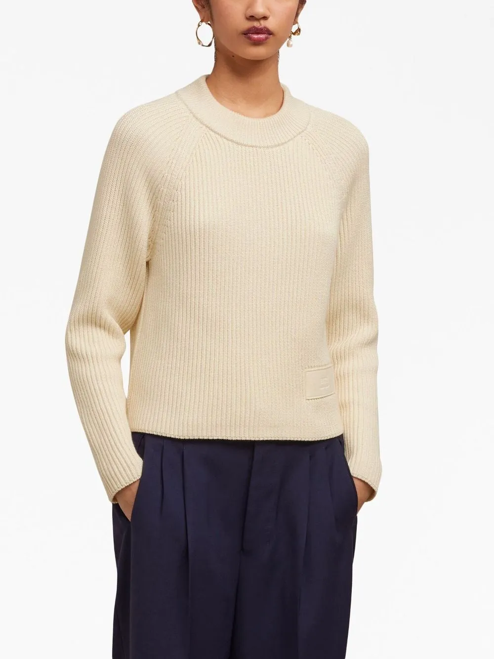 Maglione con patch logo in beige - donna