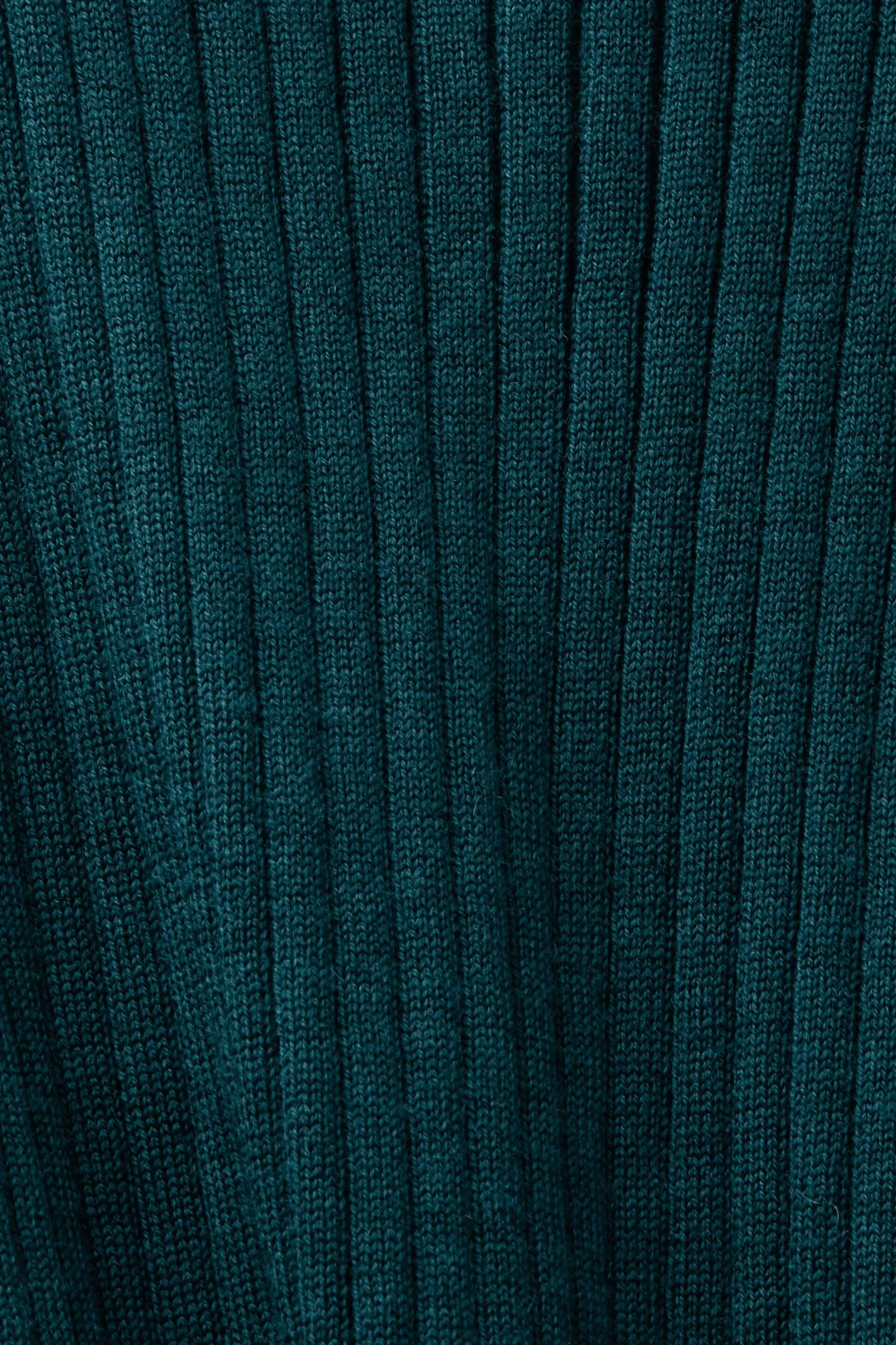 Maglione smanicato in lana merino extra fine