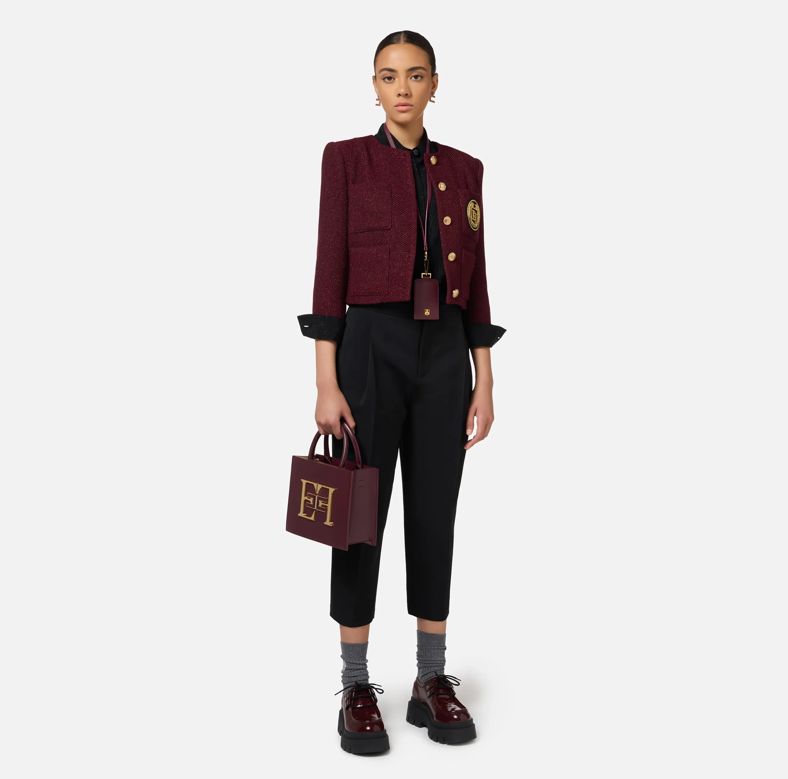 Pantalone cropped in fresco di lana stretch con pinces