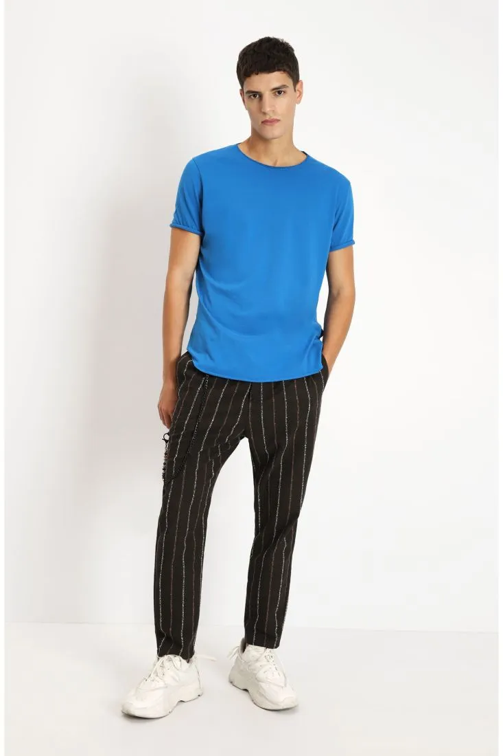 Pantaloni cropped a righe effetto lurex