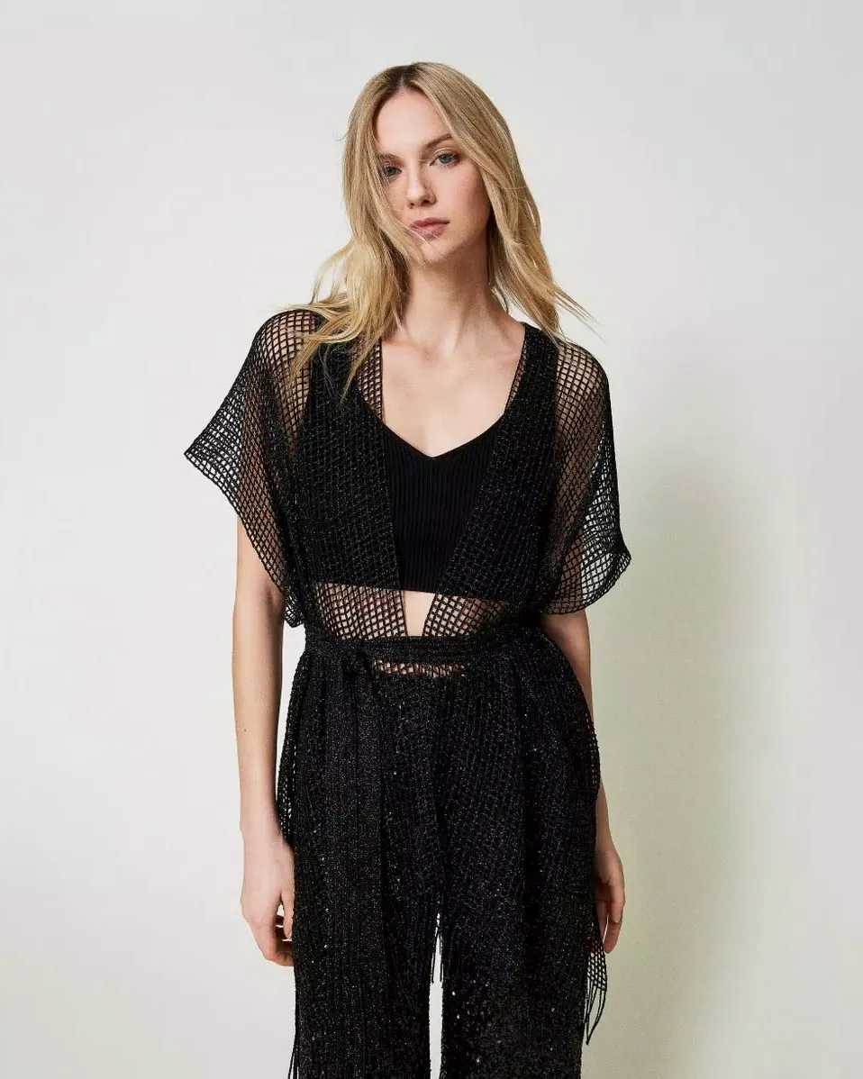 Poncho nero in rete viscosa con lurex con cintura in vita e frange al fondo